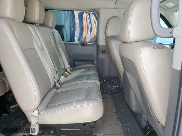 2017 Nissan NV Passenger SL with VIN 5BZAF0AA5HN850974, listed as a Copart auction lot 52101385 with 129,011 mi miles and Salvage Title. Bid and sale history available at carsss.com. Image 11.