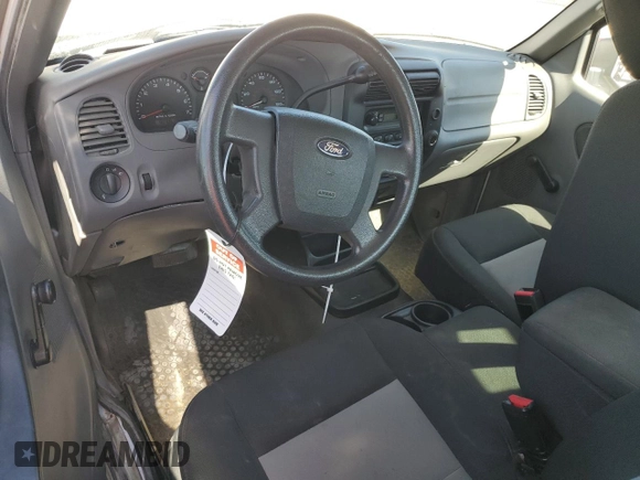 2011 Ford Ranger with VIN 1FTLR1EE0BPA14164, listed as a Copart auction lot 77312154 with 90,705 mi miles and Salvage Title. Bid and sale history available at DreamBid. Image 8.
