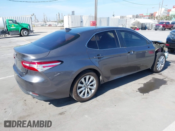 2019 Toyota Camry LE with VIN 4T1B11HK2KU240465, listed as a IAAI auction lot 42095075 with 67,852 mi miles and . Bid and sale history available at DreamBid. Image 4.