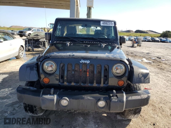 2013 Jeep Wrangler Sport with VIN 1C4AJWAG0DL618634, listed as a Copart auction lot 48982315 with 251,955 mi miles and Clean Title. Bid and sale history available at carsss.com. Image 5.
