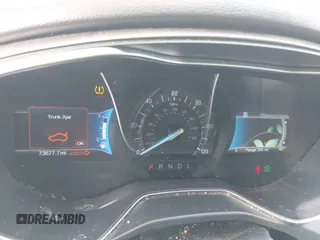 2018 Ford Fusion SE z VIN 3FA6P0LU5JR188171, wystawiony jako IAAI lot #41632358 z przebiegiem 73 677 mil mil oraz . Historia ofert i sprzedaży dostępna na DreamBid. Obrazek 7.