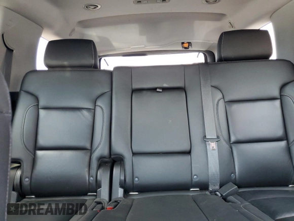 2020 Chevrolet Tahoe LT with VIN 1GNSKBKC0LR260766, listed as a Copart auction lot 61465725 with 104,850 mi miles and Salvage title. Bid and sale history available at DreamBid. Image 10.