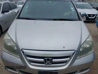 2005 Honda Odyssey EX-L with VIN 5FNRL38625B421123, listed as a IAAI auction lot 41886027 with 174,459 mi miles. Bid and sale history available at carsss.com. Image 10.