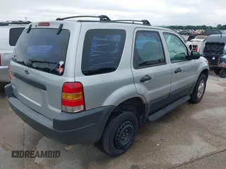 2003 Ford Escape XLS Popular with VIN 1FMYU02123KA32790, listed as a IAAI auction lot 42122524 with 244,560 mi miles and . Bid and sale history available at DreamBid. Image 4.