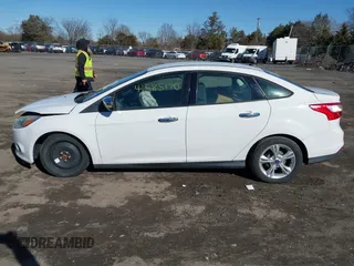 2014 Ford Focus SE with VIN 1FADP3F21EL119923, listed as a IAAI auction lot 41585170 with 126,266 mi miles. Bid and sale history available at carsss.com. Image 15.