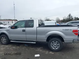 2014 Ford F-150 XL with VIN 1FTFX1ET3EFC39285, listed as a IAAI auction lot 41390024 with 217,856 mi miles. Bid and sale history available at carsss.com. Image 14.