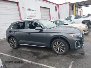 2023 Audi Q5 S line Premium Plus z VIN WA1EAAFY7P2178566, wystawiony jako IAAI lot #41734994 z przebiegiem Nie podano mil oraz . Historia ofert i sprzedaży dostępna na DreamBid. Obrazek 13.