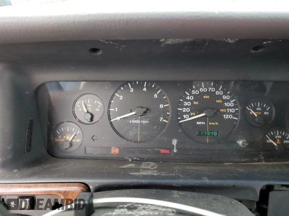 1998 Jeep Grand Cherokee Laredo with VIN 1J4GZ58SXWC293835, listed as a Copart auction lot 47557855 with 217,948 mi miles and Salvage Title. Bid and sale history available at carsss.com. Image 9.