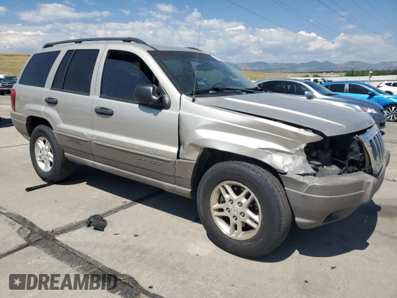 2003 Jeep Grand Cherokee Laredo with VIN 1J4GW48S23C524693, listed as a Copart auction lot 64461755 with 243,936 mi miles and Salvage title. Bid and sale history available at DreamBid. Image 4.