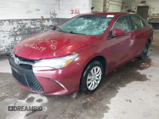 2015 Toyota Camry XLE with VIN 4T1BF1FK8FU932854, listed as a IAAI auction lot 41872099 with Not Provided miles and . Bid and sale history available at DreamBid. Image 2.