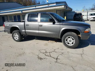 2004 Dodge Dakota Sport z VIN 1D7HG38K94S556894, wystawiony jako Copart lot #79743994 z przebiegiem 174 933 mil mil oraz Szkoda całkowita • Salvage title. Historia ofert i sprzedaży dostępna na DreamBid. Obrazek 4.