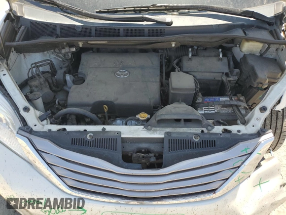2015 Toyota Sienna XLE with VIN 5TDYK3DC1FS690219, listed as a Copart auction lot 60926525 with 97,879 mi miles and Salvage title. Bid and sale history available at DreamBid. Image 12.