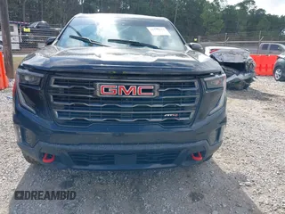 2024 GMC Acadia AWD AT4 z VIN 1GKENPKSHRJ155390, wystawiony jako IAAI lot #41510512 z przebiegiem Nie podano mil oraz . Historia ofert i sprzedaży dostępna na DreamBid. Obrazek 6.