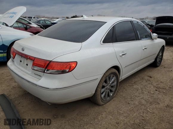2009 Hyundai Azera Limited z VIN KMHFC46F69A387497, wystawiony jako Copart lot #83303664 z przebiegiem 115 815 mil mil oraz Szkoda całkowita • Salvage title. Historia ofert i sprzedaży dostępna na DreamBid. Obrazek 3.