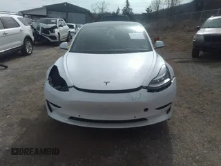 2020 Tesla Model 3 Standard Range Plus with VIN 5YJ3E1EA0LF597839, listed as a IAAI auction lot 41639219 with 49,220 mi miles. Bid and sale history available at carsss.com. Image 13.