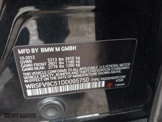 2013 BMW M5 with VIN WBSFV9C51DD095750, listed as a IAAI auction lot 40907304 with 93,014 mi miles. Bid and sale history available at carsss.com. Image 9.