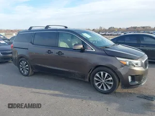 2016 Kia Sedona EX with VIN KNDMC5C1XG6159271, listed as a IAAI auction lot 41409277 with 95,696 mi miles. Bid and sale history available at carsss.com. Image 13.