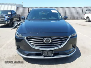 2016 Mazda CX-9 Grand Touring with VIN JM3TCBDY4G0113693, listed as a IAAI auction lot 41965857 with 152,403 mi miles and . Bid and sale history available at DreamBid. Image 13.