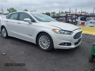 2016 Ford Fusion SE Hybrid z VIN 3FA6P0LU1GR140885, wystawiony jako IAAI lot #42380280 z przebiegiem 120 543 mil mil oraz . Historia ofert i sprzedaży dostępna na DreamBid. Obrazek 1.