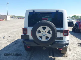 2017 Jeep Wrangler Unlimited Rubicon with VIN 1C4BJWFG9HL695361, listed as a IAAI auction lot 42010655 with 65,536 mi miles and . Bid and sale history available at DreamBid. Image 16.
