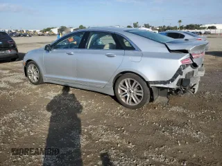 2014 Lincoln MKZ with VIN 3LN6L2JKXER806539, listed as a Copart auction lot 42724215 with 104,283 mi miles and Salvage title. Bid and sale history available at DreamBid. Image 2.