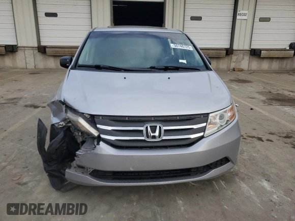2012 Honda Odyssey EX-L with VIN 5FNRL5H60CB117376, listed as a Copart auction lot 50740725 with 163,716 mi miles and Salvage Title. Bid and sale history available at DreamBid. Image 5.