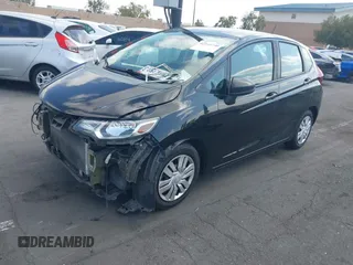 2015 Honda Fit LX z VIN 3HGGK5H52FM765921, wystawiony jako IAAI lot #42135740 z przebiegiem 82 647 mil mil oraz . Historia ofert i sprzedaży dostępna na DreamBid. Obrazek 18.