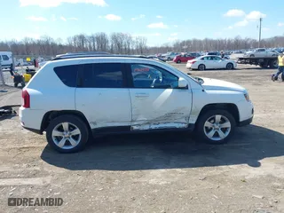 2016 Jeep Compass High Altitude Edition with VIN 1C4NJDEBXGD635864, listed as a IAAI auction lot 41895063 with 95,246 mi miles. Bid and sale history available at carsss.com. Image 13.