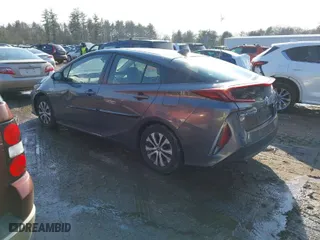 2021 Toyota Prius Prime LE with VIN JTDKAMFP0M3187116, listed as a IAAI auction lot 41678273 with 75,086 mi miles. Bid and sale history available at carsss.com. Image 3.
