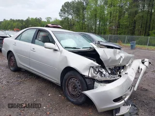 2003 Toyota Camry LE with VIN 4T1BE32K63U755835, listed as a IAAI auction lot 41976402 with 215,788 mi miles and . Bid and sale history available at DreamBid. Image 1.