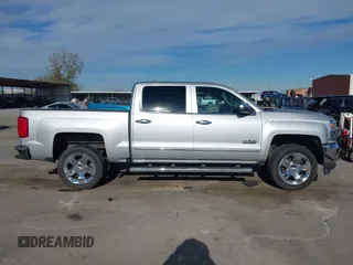 2017 Chevrolet Silverado 1500 LTZ with VIN 3GCPCSEC1HG482764, listed as a IAAI auction lot 41259389 with 147,738 mi miles and . Bid and sale history available at DreamBid. Image 14.