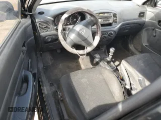 2010 Hyundai Accent GS z VIN KMHCM3AC7AU173953, wystawiony jako Copart lot #51433465 z przebiegiem 176 462 mil mil oraz Szkoda całkowita • Salvage title. Historia ofert i sprzedaży dostępna na DreamBid. Obrazek 8.