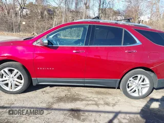2019 Chevrolet Equinox Premier with VIN 3GNAXYEX0KS637042, listed as a IAAI auction lot 41160290 with 16,754 mi miles and . Bid and sale history available at DreamBid. Image 14.