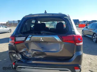 2019 Mitsubishi Outlander ES with VIN JA4AD2A38KZ010698, listed as a IAAI auction lot 41481509 with 112,146 mi miles. Bid and sale history available at carsss.com. Image 6.