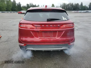 2015 Lincoln MKC z VIN 5LMTJ2AHXFUJ10820, wystawiony jako Copart lot #57139315 z przebiegiem 128 714 mil mil oraz Szkody całkowita. Historia ofert i sprzedaży dostępna na DreamBid. Obrazek 6.
