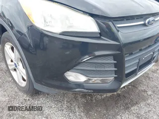 2014 Ford Escape SE with VIN 1FMCU9GX2EUB68419, listed as a IAAI auction lot 42741491 with Not provided miles and . Bid and sale history available at DreamBid. Image 12.