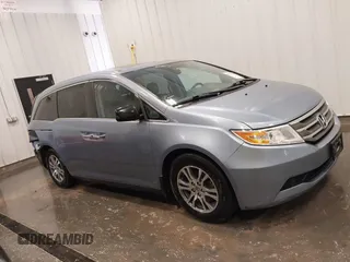 2013 Honda Odyssey EX-L with VIN 5FNRL5H67DB015512, listed as a IAAI auction lot 41758695 with 193,356 mi miles and . Bid and sale history available at carsss.com. Image 14.