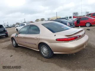 1997 Mercury Sable LS with VIN 1MELM53S8VA602057, listed as a IAAI auction lot 41468005 with 71,203 mi miles. Bid and sale history available at carsss.com. Image 14.