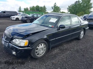 2004 Acura RL w/Navigation System with VIN JH4KA96624C003779, listed as a IAAI auction lot 39542033 with 80,018 mi miles. Bid and sale history available at carsss.com. Image 2.