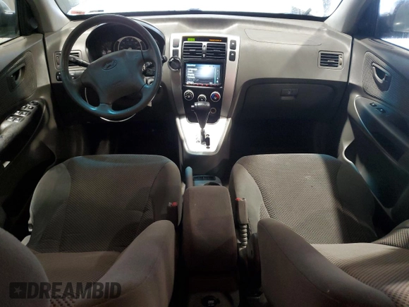 2007 Hyundai Tucson SE with VIN KM8JN12D27U491472, listed as a Copart auction lot 51324115 with 106,894 mi miles and Salvage Title. Bid and sale history available at carsss.com. Image 8.
