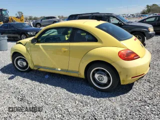 2012 Volkswagen Beetle 2.5L PZEV with VIN 3VWJP7AT0CM628771, listed as a Copart auction lot 47974775 with 70,940 mi miles and Salvage Title. Bid and sale history available at carsss.com. Image 2.
