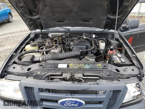 2010 Ford Ranger XL z VIN 1FTKR1ED9APA19705, wystawiony jako Copart lot #50454675 z przebiegiem 202 755 mil mil oraz Szkoda całkowita • Salvage title. Historia ofert i sprzedaży dostępna na DreamBid. Obrazek 11.