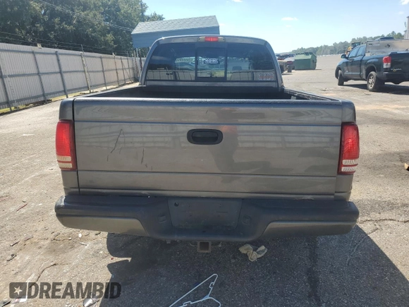 2003 Dodge Dakota Sport with VIN 1D7HL38N43S184708, listed as a Copart auction lot 73320964 with 143,398 mi miles and Salvage Title. Bid and sale history available at carsss.com. Image 6.