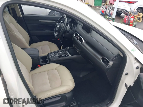 2018 Mazda CX-5 Touring with VIN JM3KFACM1J1431462, listed as a IAAI auction lot 41038099 with 77,489 mi miles. Bid and sale history available at carsss.com. Image 5.