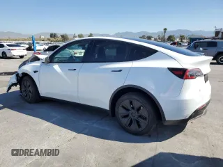 2024 Tesla Model Y with VIN 7SAYGDED5RF196309, listed as a Copart auction lot 44608545 with 7,226 mi miles and Salvage Title. Bid and sale history available at DreamBid. Image 2.
