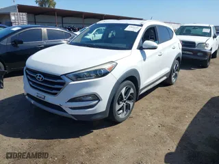 2017 Hyundai Tucson Value with VIN KM8J33A27HU438902, listed as a IAAI auction lot 41835502 with 84,885 mi miles. Bid and sale history available at carsss.com. Image 2.