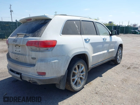 2014 Jeep Grand Cherokee Summit z VIN 1C4RJFJG3EC213145, wystawiony jako IAAI lot #41918145 z przebiegiem 176 460 mil mil oraz . Historia ofert i sprzedaży dostępna na DreamBid. Obrazek 4.