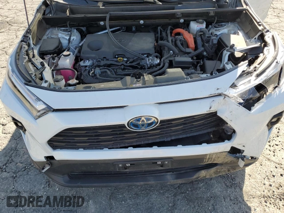 2024 Toyota RAV4 Hybrid XLE Premium with VIN JTMB6RFV6RD120633, listed as a Copart auction lot 57620825 with 28,817 mi miles and Salvage title. Bid and sale history available at DreamBid. Image 12.