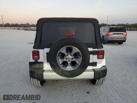 2017 Jeep Wrangler Unlimited Sahara with VIN 1C4BJWEG4HL701813, listed as a Copart auction lot 84496424 with 49,858 mi miles and Salvage title. Bid and sale history available at DreamBid. Image 6.