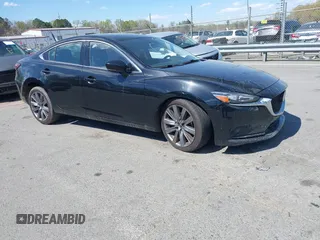 2018 Mazda Mazda6 Touring with VIN JM1GL1VM2J1308743, listed as a IAAI auction lot 41872947 with 125,236 mi miles. Bid and sale history available at carsss.com. Image 1.